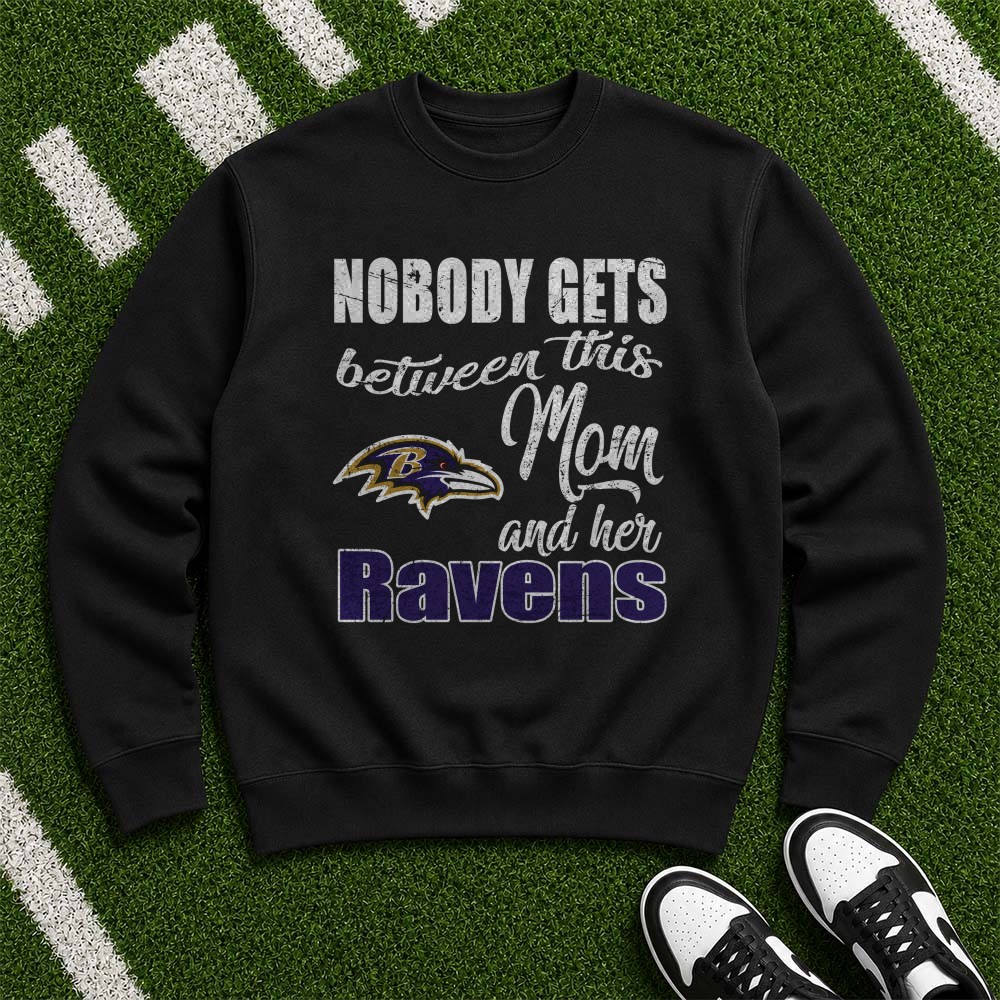 Nobody Gets Between This Mom And Her Ravens Fierce Mother Baltimore Ravens NFL T-Shirt Nobody Gets Between This Mom And Her Ravens Fierce Mother Baltimore Ravens NFL T-Shirt