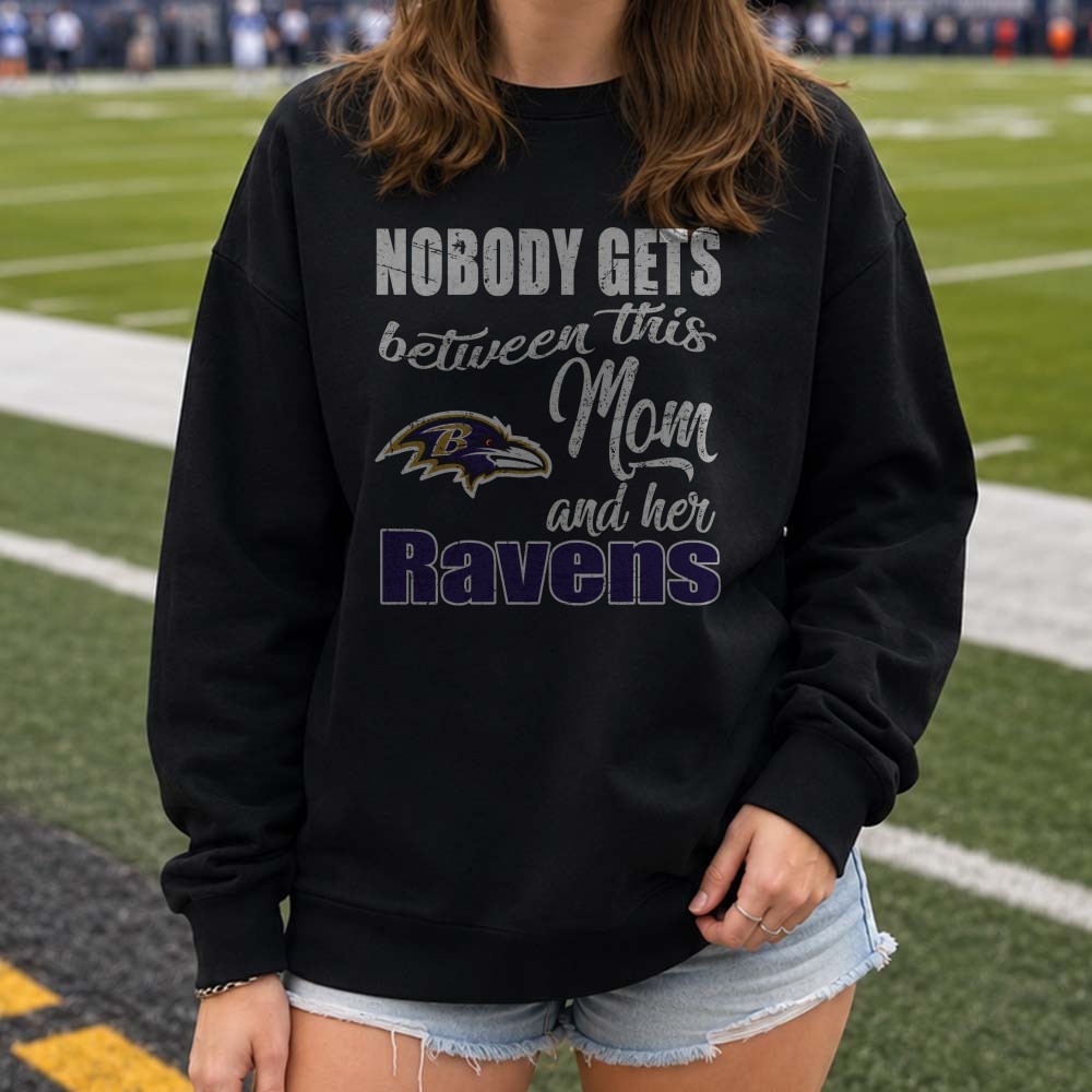 Nobody Gets Between This Mom And Her Ravens Fierce Mother Baltimore Ravens NFL T-Shirt Nobody Gets Between This Mom And Her Ravens Fierce Mother Baltimore Ravens NFL T-Shirt